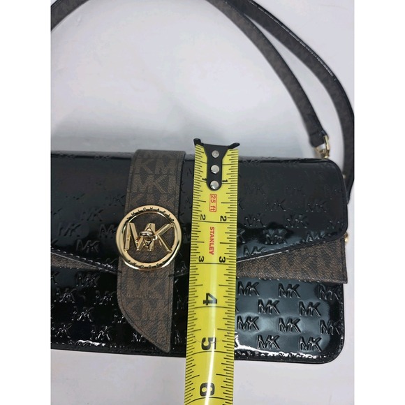 Michael Kors Greenwich medium logo-embossed patent leather shoulder bag in black - Picture 7 of 8